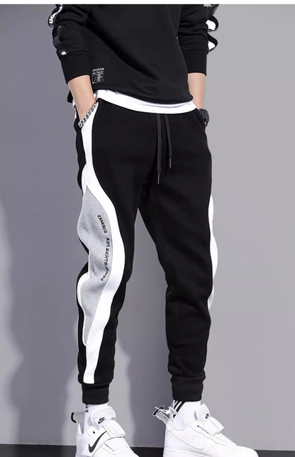 11 pantalones de chándal estampados para hombre, pantalones para correr de retales, traje masculino, pantalones sueltos, pantalones rectos, nueva ropa de moda para primavera y otoño