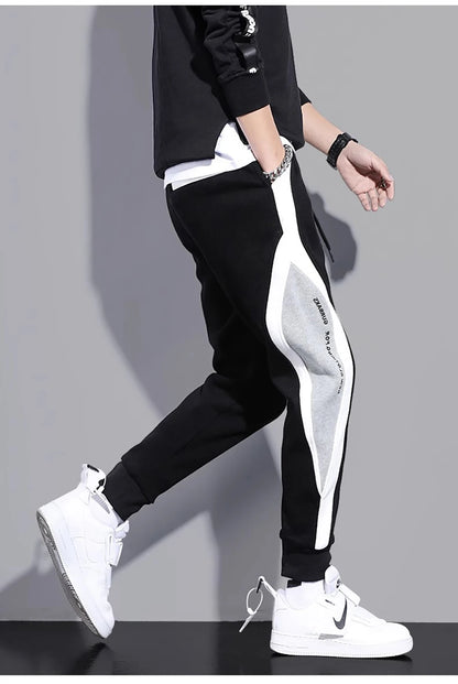11 pantalones de chándal estampados para hombre, pantalones para correr de retales, traje masculino, pantalones sueltos, pantalones rectos, nueva ropa de moda para primavera y otoño