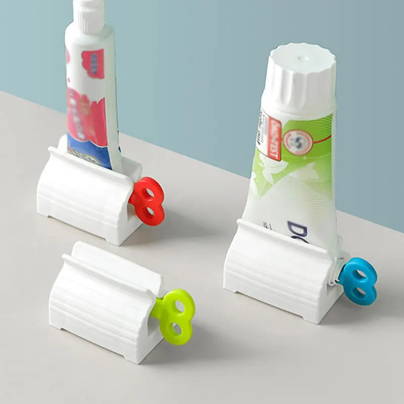 Tubo de pasta de dientes exprimidor con Clip limpiador Facial prensa Manual exprimidor de pasta de dientes compañero suministros de baño multifuncionales