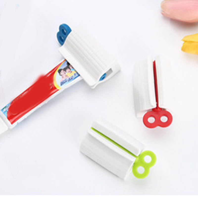 Tubo de pasta de dientes exprimidor con Clip limpiador Facial prensa Manual exprimidor de pasta de dientes compañero suministros de baño multifuncionales