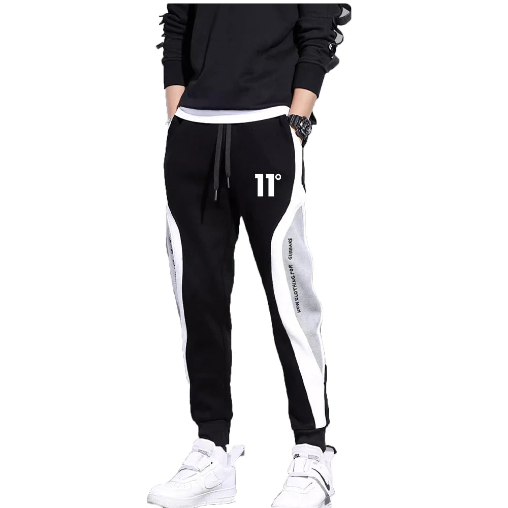 11 pantalones de chándal estampados para hombre, pantalones para correr de retales, traje masculino, pantalones sueltos, pantalones rectos, nueva ropa de moda para primavera y otoño