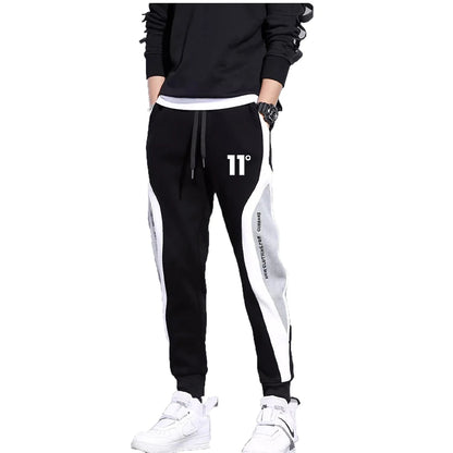 11 pantalones de chándal estampados para hombre, pantalones para correr de retales, traje masculino, pantalones sueltos, pantalones rectos, nueva ropa de moda para primavera y otoño