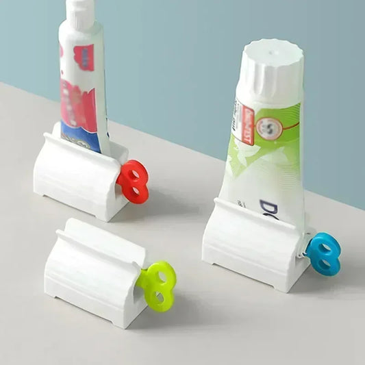 Tubo de pasta de dientes exprimidor con Clip limpiador Facial prensa Manual exprimidor de pasta de dientes compañero suministros de baño multifuncionales
