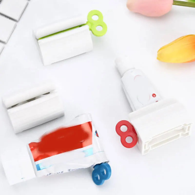 Tubo de pasta de dientes exprimidor con Clip limpiador Facial prensa Manual exprimidor de pasta de dientes compañero suministros de baño multifuncionales