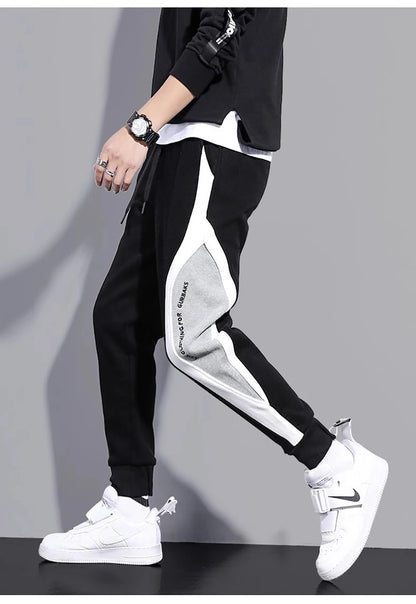 11 pantalones de chándal estampados para hombre, pantalones para correr de retales, traje masculino, pantalones sueltos, pantalones rectos, nueva ropa de moda para primavera y otoño