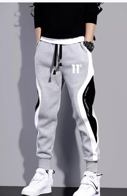 11 pantalones de chándal estampados para hombre, pantalones para correr de retales, traje masculino, pantalones sueltos, pantalones rectos, nueva ropa de moda para primavera y otoño